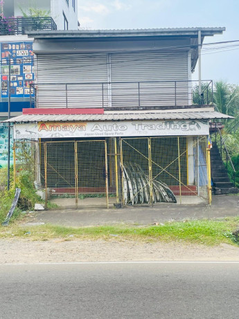 Two story house with two story commercial building (Four seperated shops)